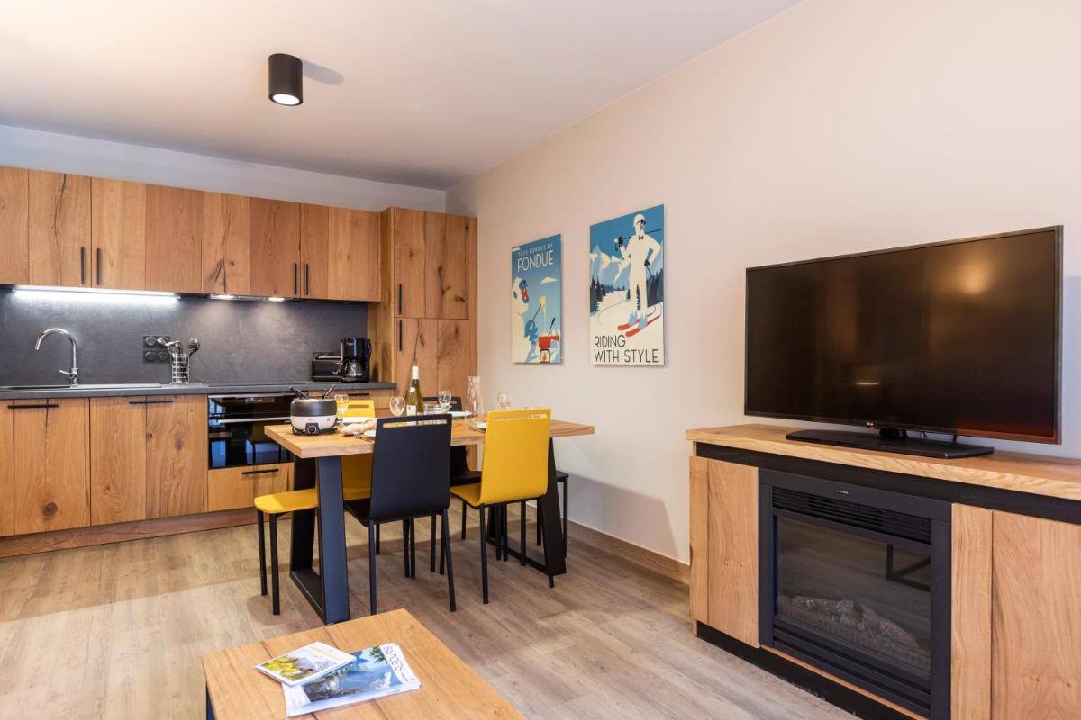Cuisine ou kitchenette dans l'établissement Résidence Club MMV Samoens