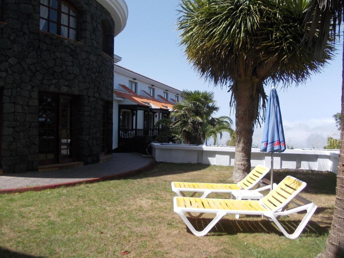 Jardín al aire libre en Hotel La Palma Romántica