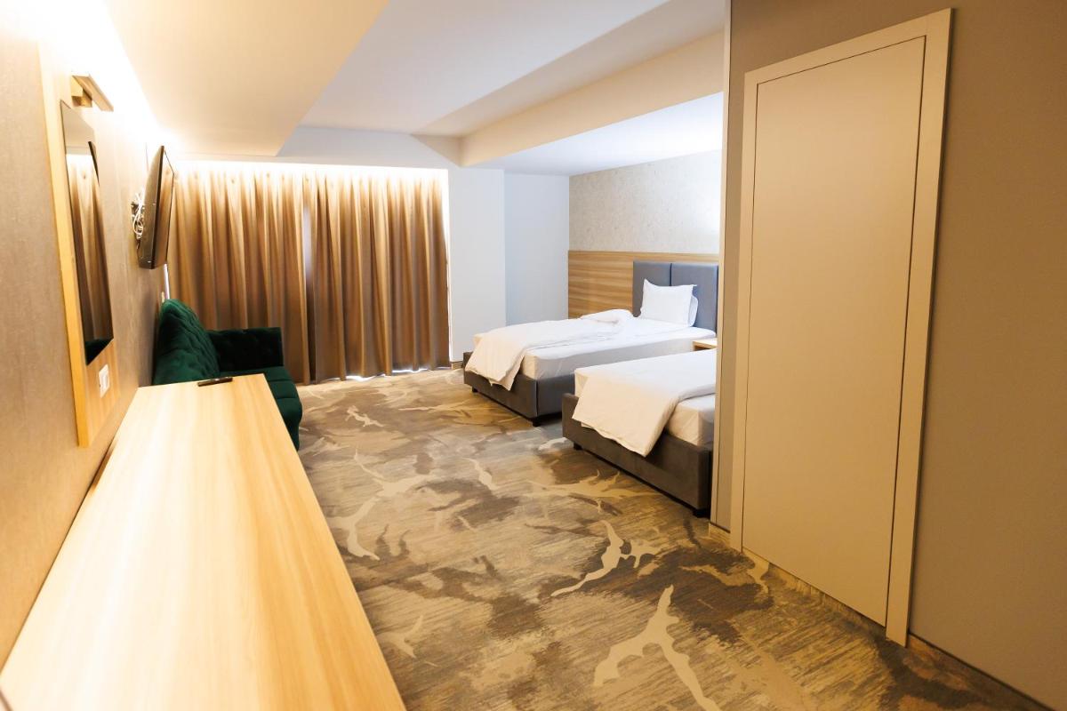 Pensiunea Axe Boutique - Housity