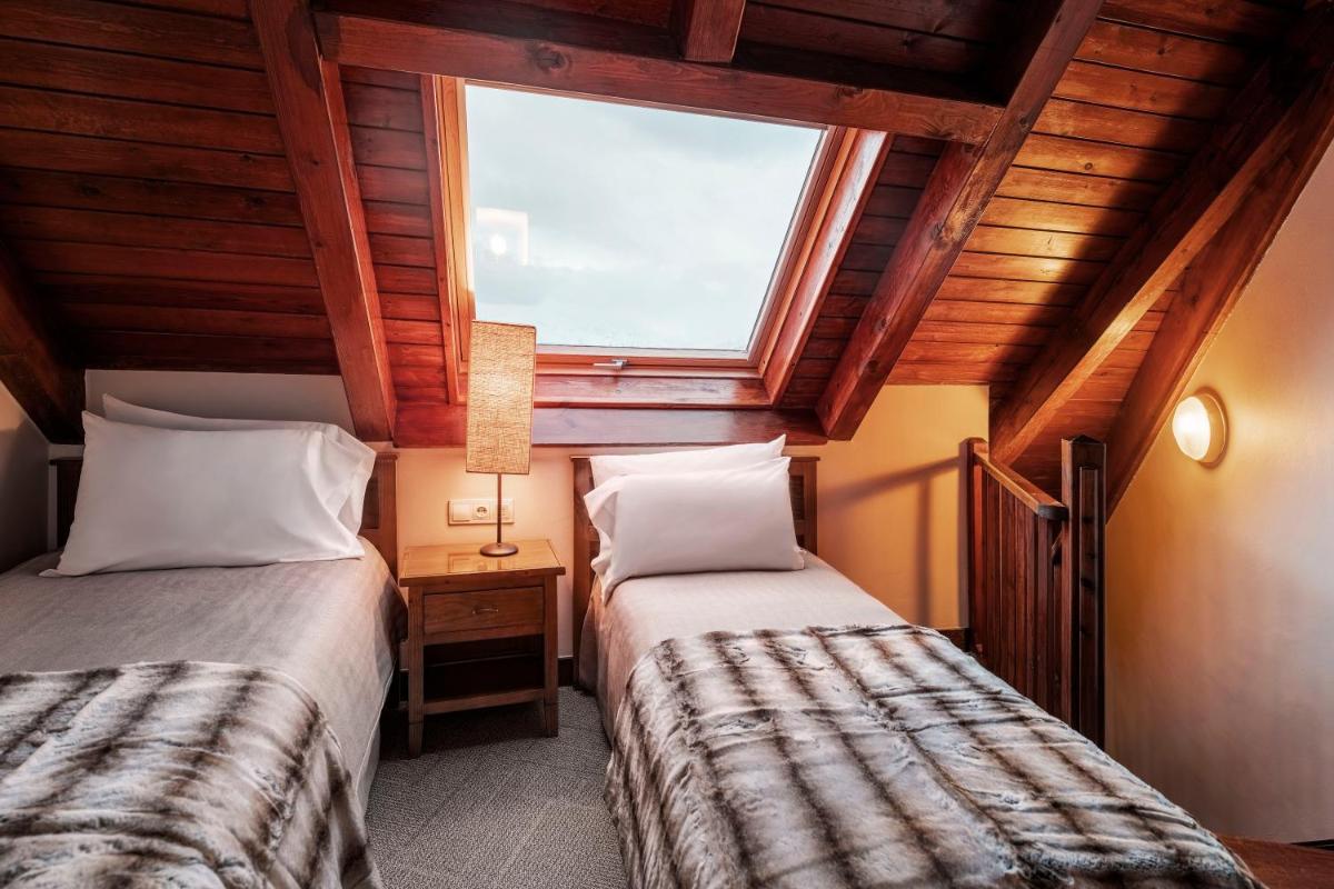 Cama o camas de una habitación en Eurostars La Pleta