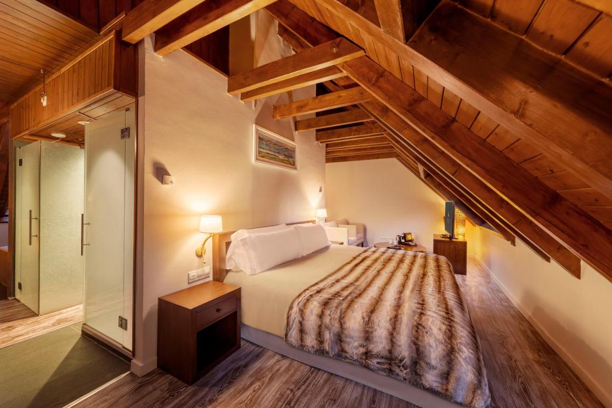 Cama o camas de una habitación en Eurostars La Pleta