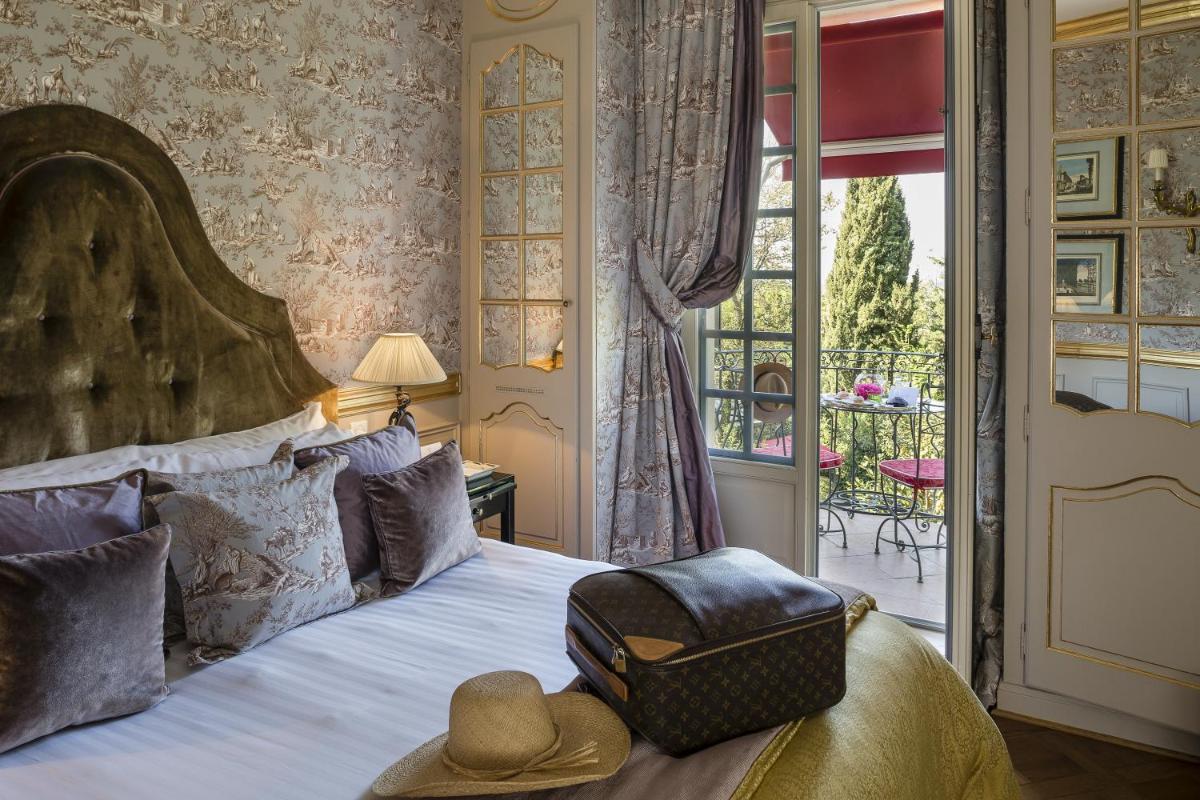 Un ou plusieurs lits dans un hébergement de l'établissement Villa Gallici Hôtel & Spa