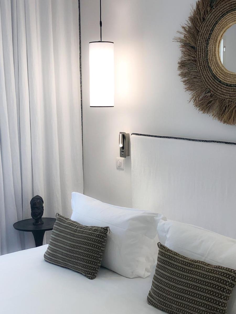 Un ou plusieurs lits dans un hébergement de l'établissement Hôtel La Dimora & Spa