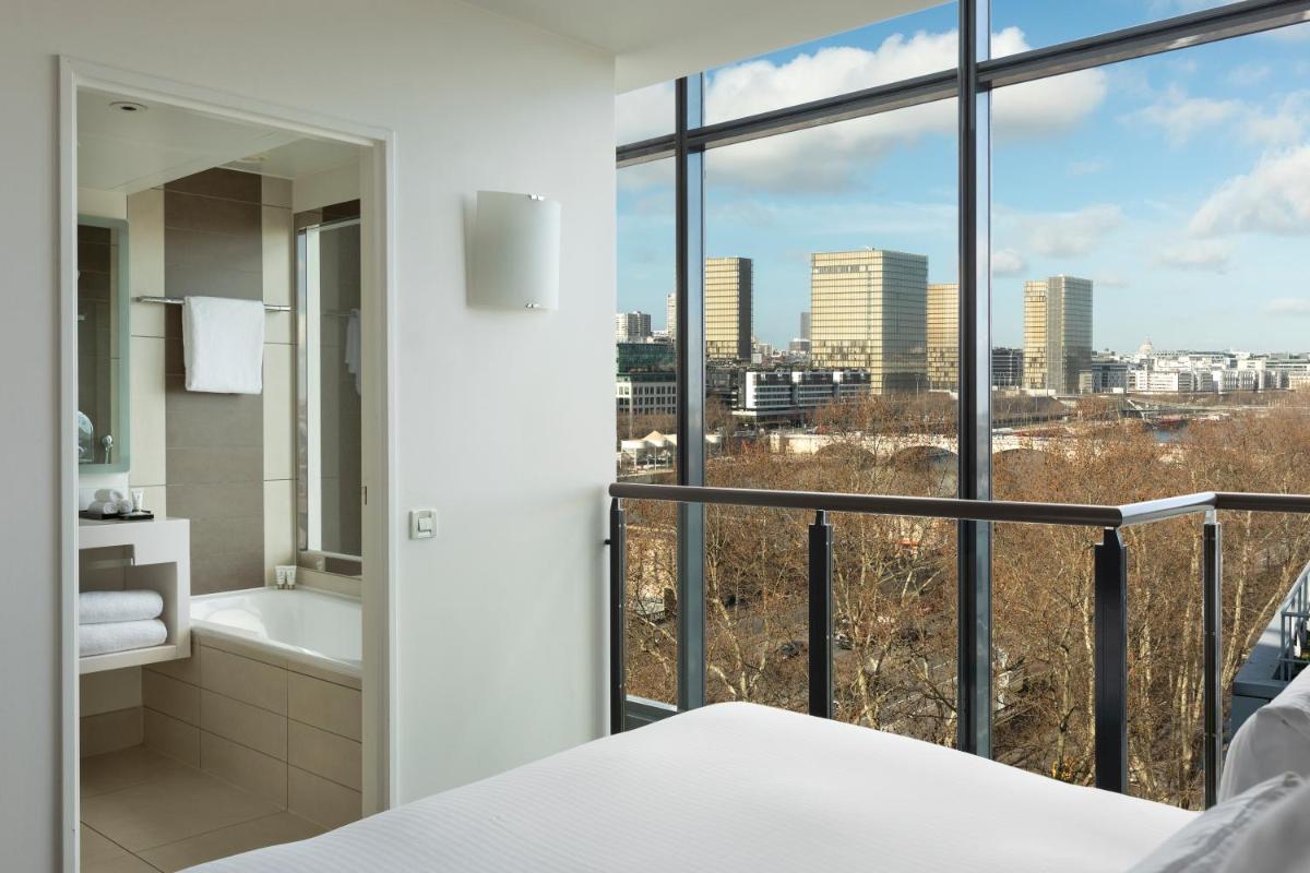 Un ou plusieurs lits dans un hébergement de l'établissement Pullman Paris Centre - Bercy