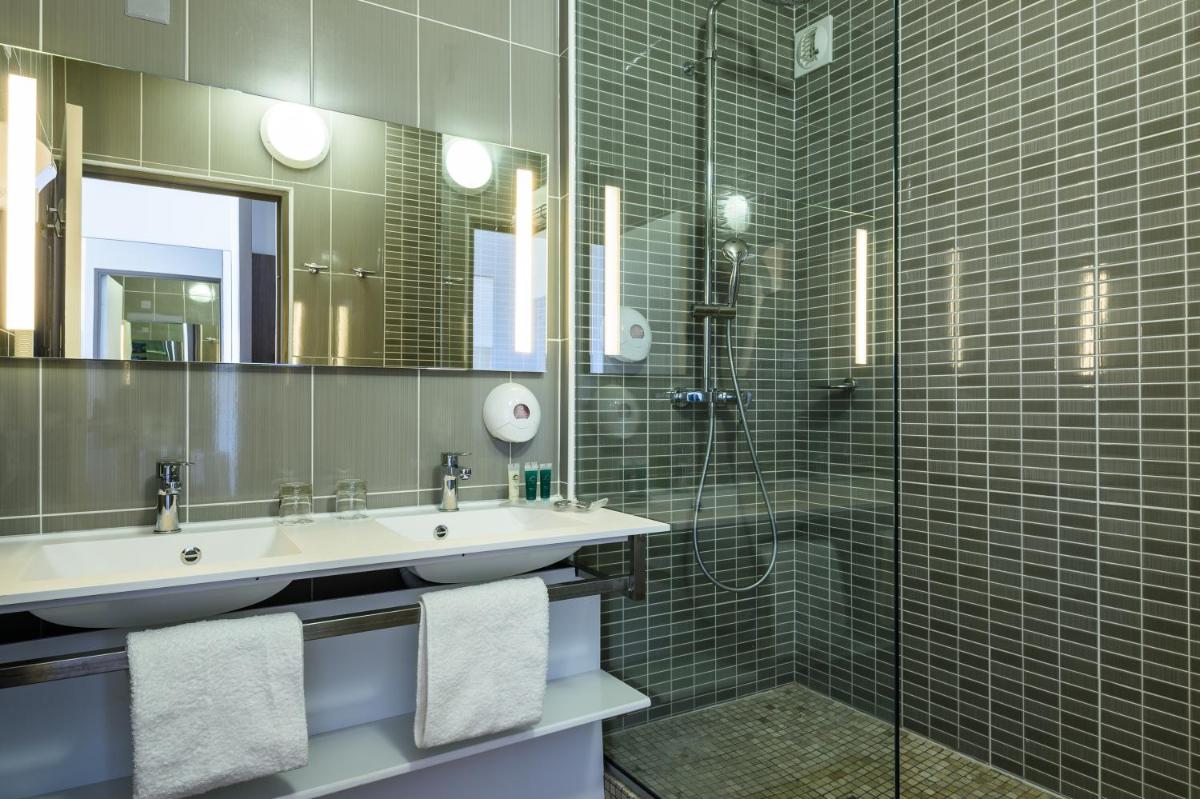 Salle de bains dans l'établissement Atlanthal