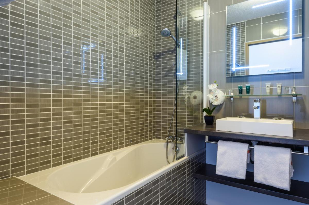 Salle de bains dans l'établissement Les Terrasses d'Atlanthal