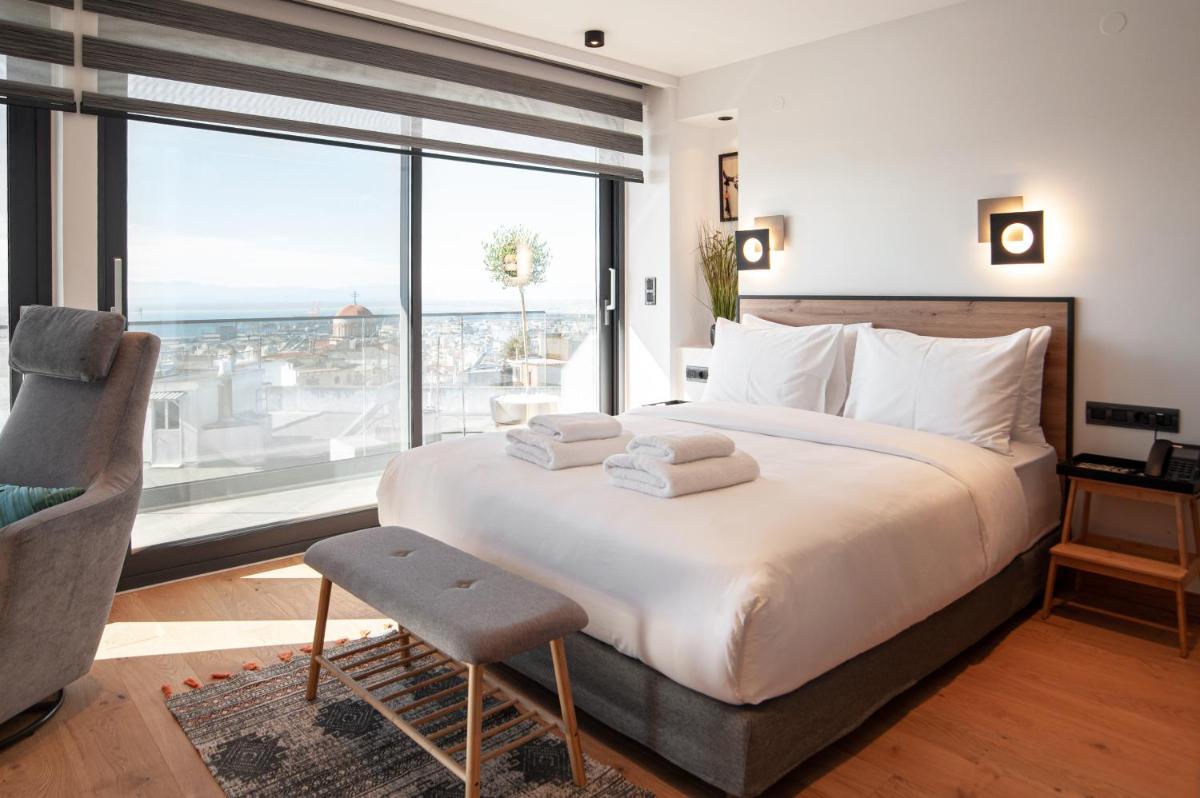 SIGMA Suites Hotel - Housity