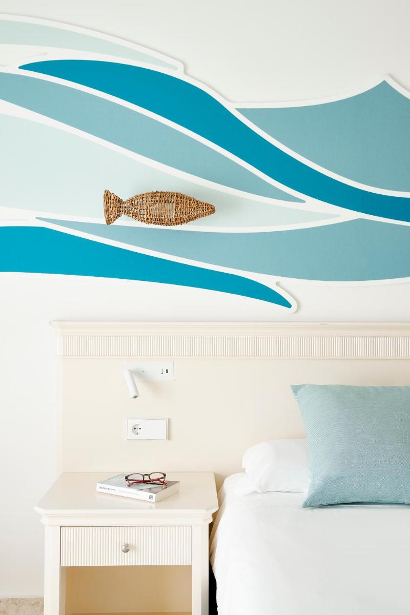 Cama o camas de una habitación en Iberostar Waves Gaviotas Park