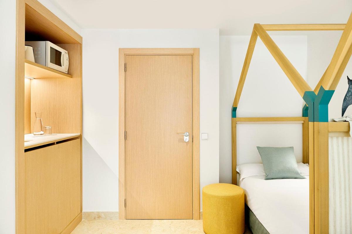 Cama o camas de una habitación en Iberostar Waves Gaviotas Park