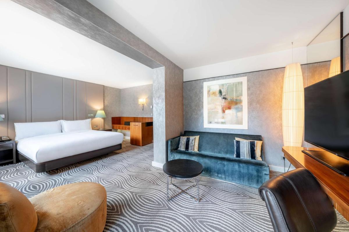 Ein Bett oder Betten in einem Zimmer der Unterkunft Hilton Berlin