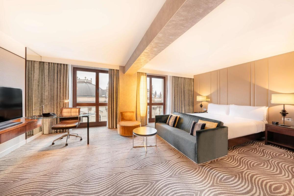 Ein Bett oder Betten in einem Zimmer der Unterkunft Hilton Berlin