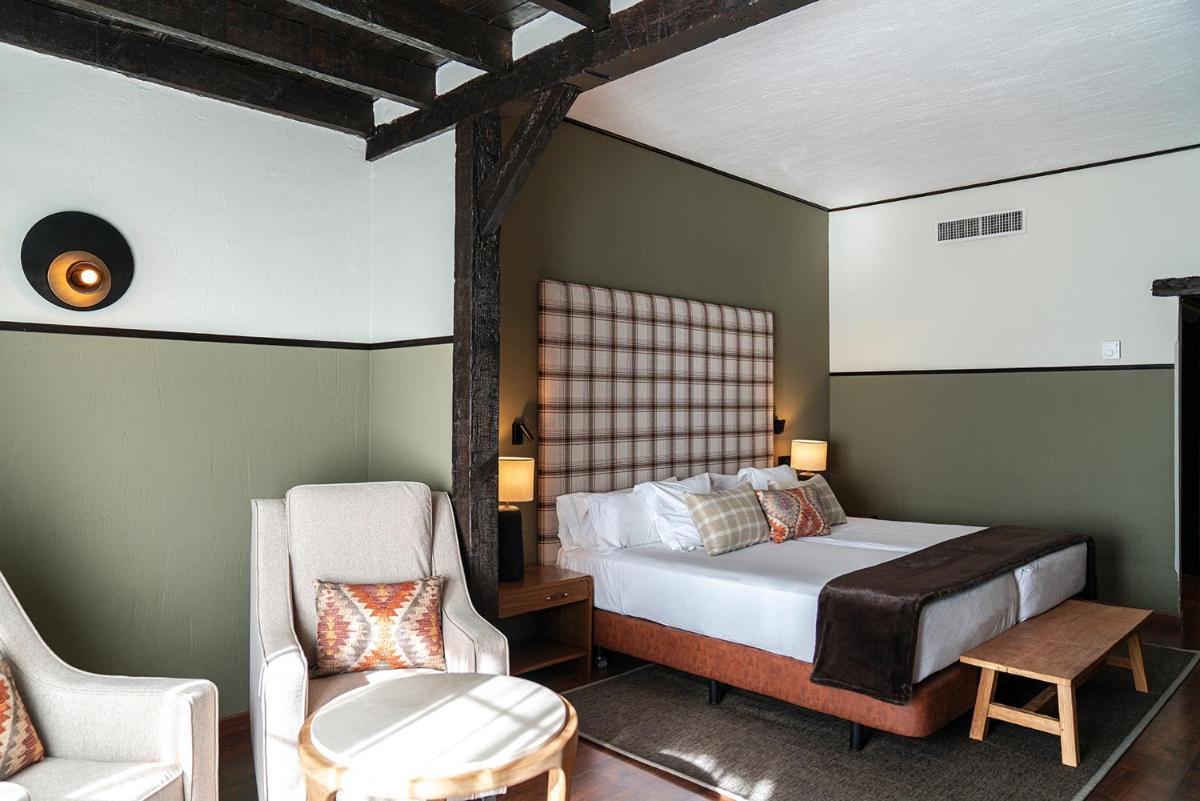 Cama o camas de una habitación en Vincci Selección Rumaykiyya
