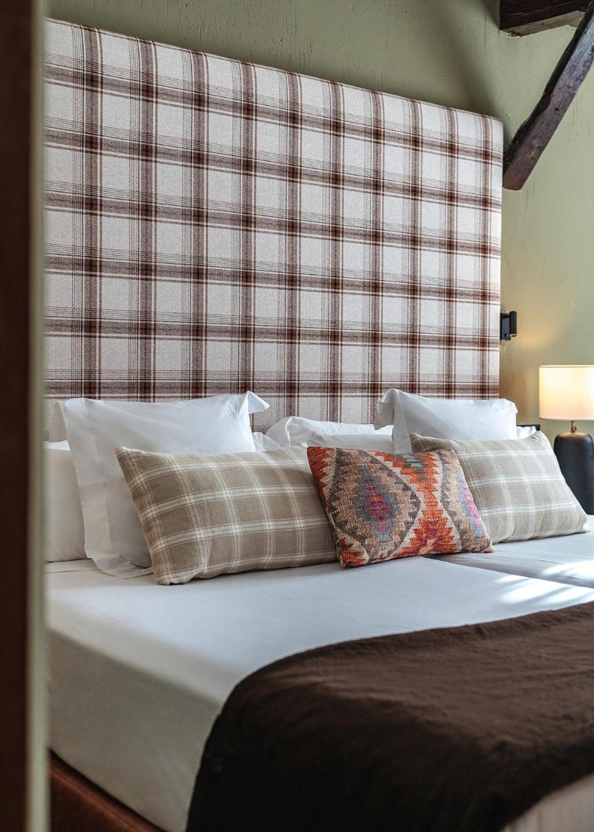 Cama o camas de una habitación en Vincci Selección Rumaykiyya