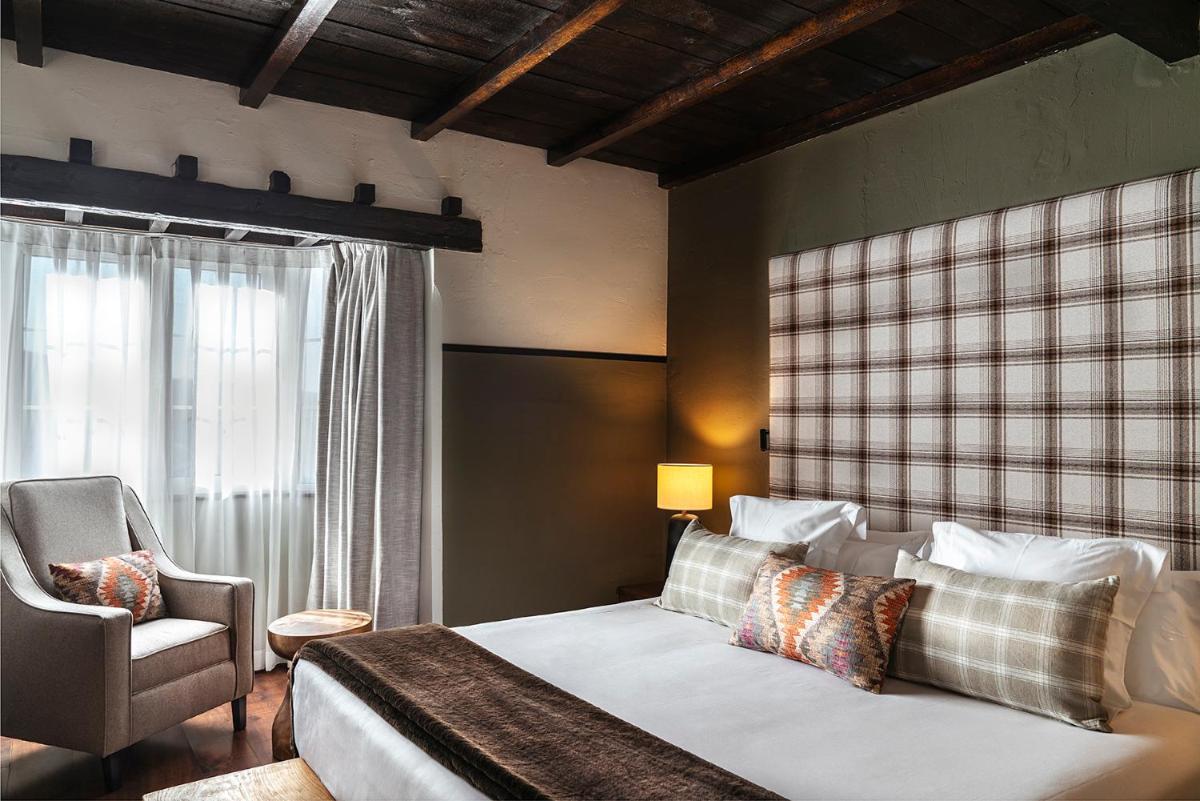 Cama o camas de una habitación en Vincci Selección Rumaykiyya