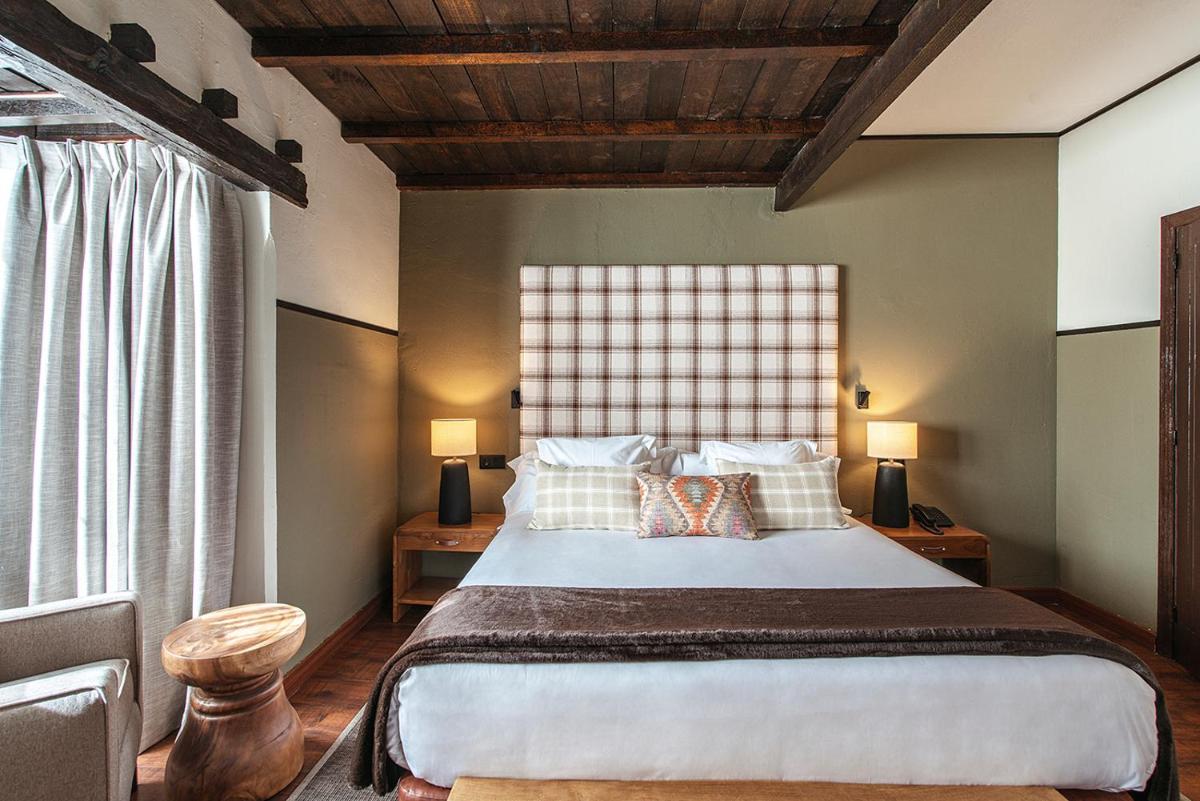 Cama o camas de una habitación en Vincci Selección Rumaykiyya