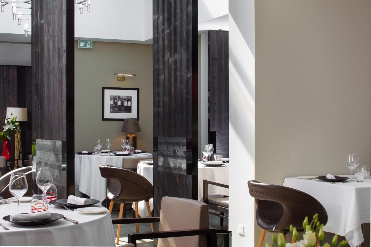 Restaurant ou autre lieu de restauration dans l'établissement Hotel Blanc