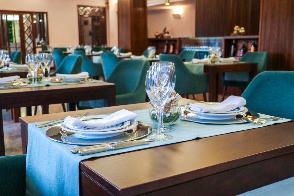Uma área de estar em Hotel São Bento da Porta Aberta & Spa