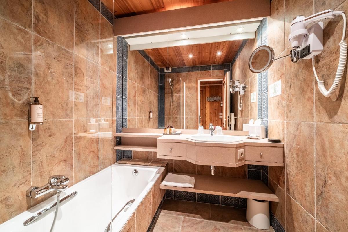 Salle de bains dans l'établissement Hotel Le Samoyede