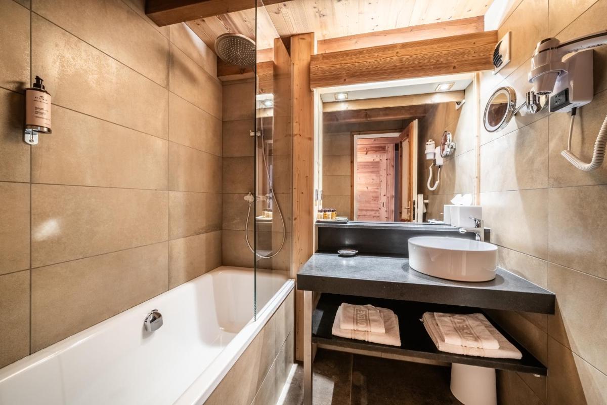 Salle de bains dans l'établissement Hotel Le Samoyede