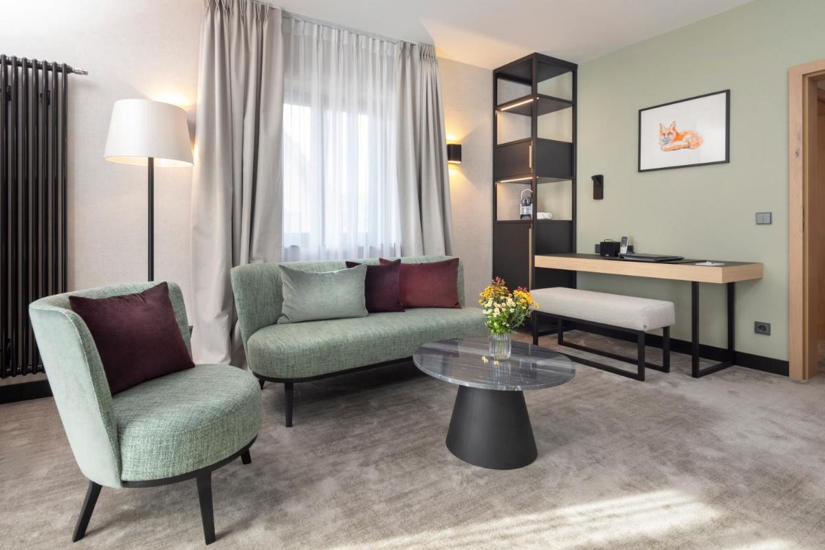 Ein Sitzbereich in der Unterkunft Wellness & Genuss Resort - Engel Obertal