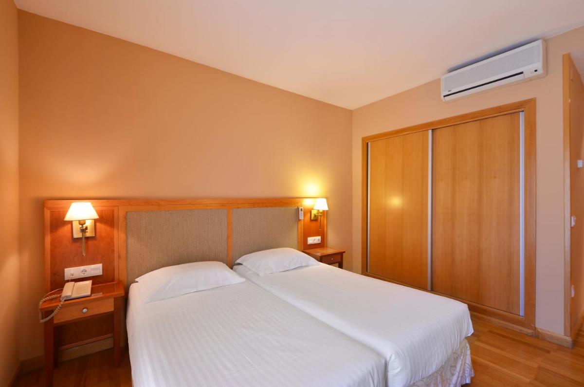 Cama o camas de una habitación en Hotel Spa Acevi Val d’Aran