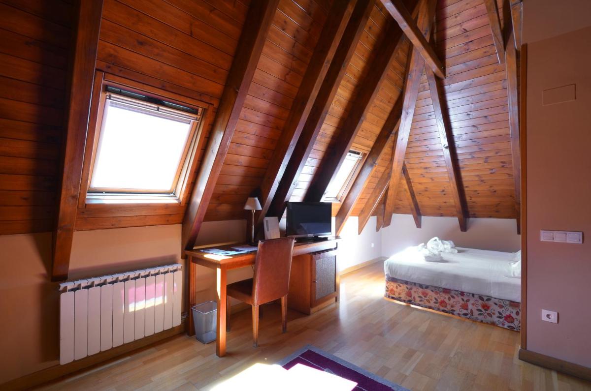 Cama o camas de una habitación en Hotel Spa Acevi Val d’Aran