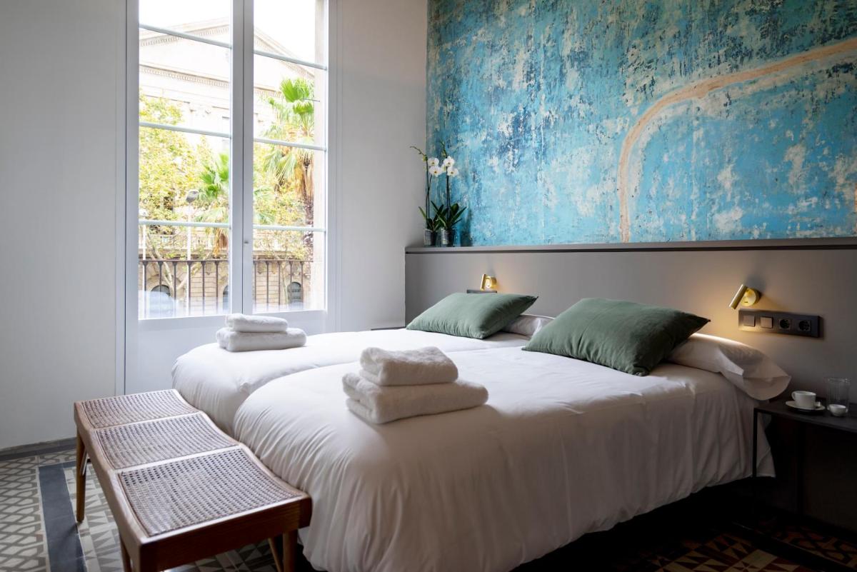 Hostal Porxos Garden - Housity