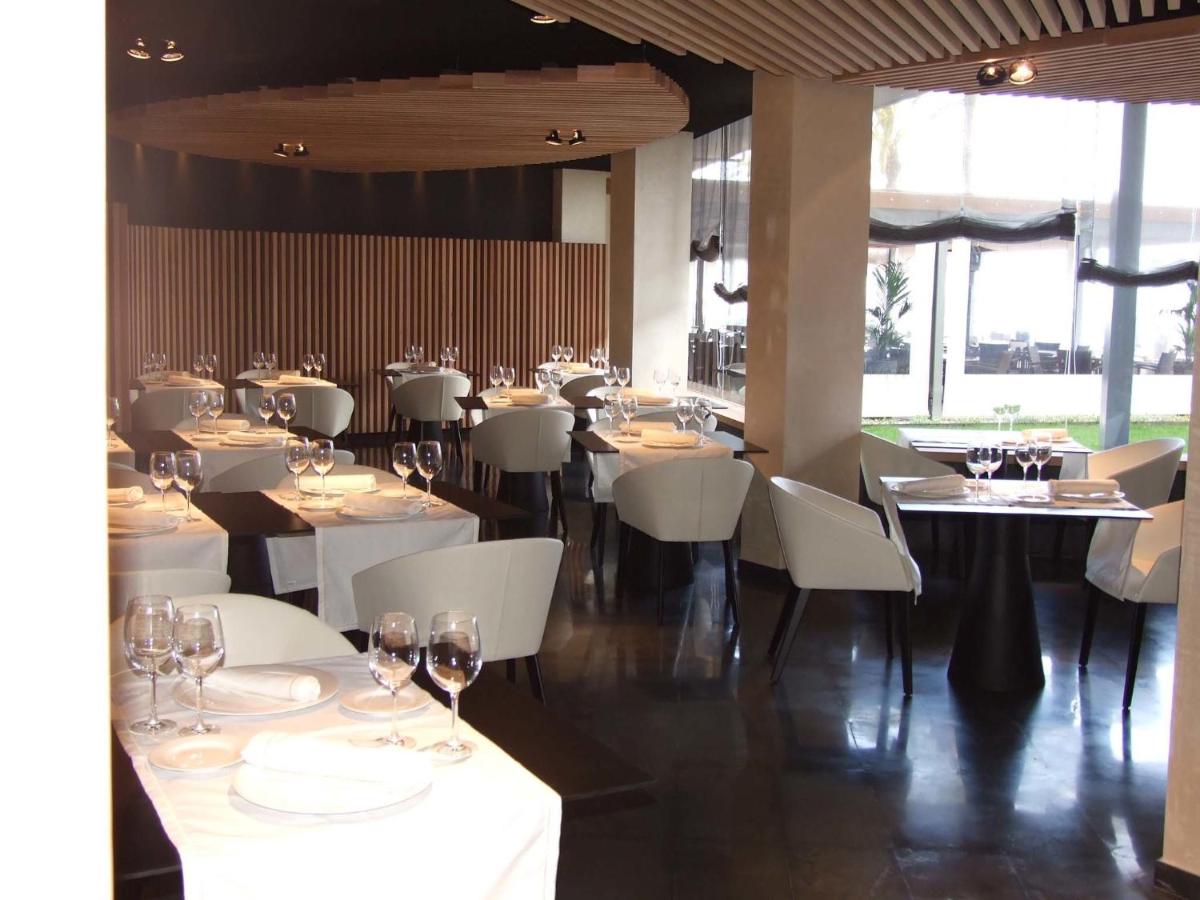 Un restaurante o sitio para comer en Palace Bonanza Playa Resort & SPA by Olivia Hotels Collection