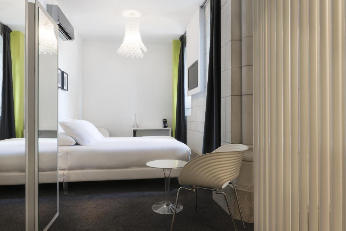 Un ou plusieurs lits dans un hébergement de l'établissement SOZO Hotel