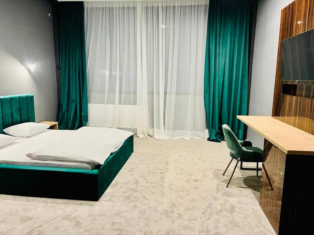 Pensiunea Butique Central - Housity