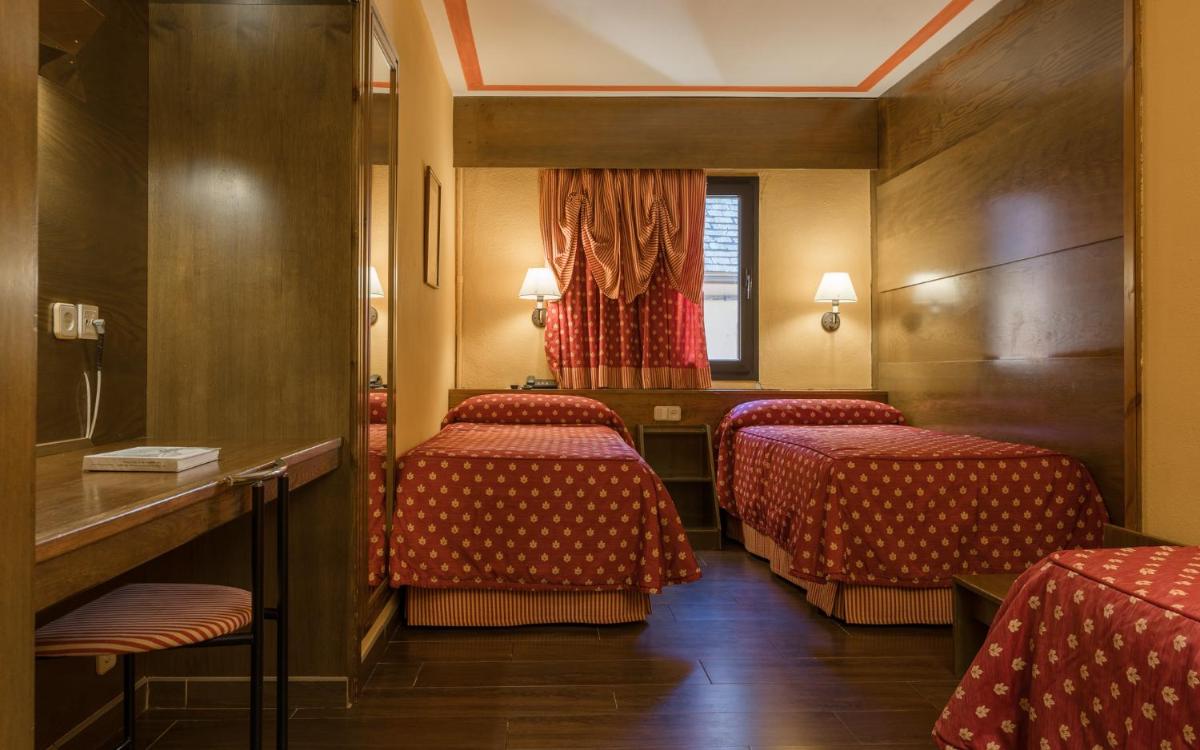 Zona de estar de Hotel Aran La Abuela