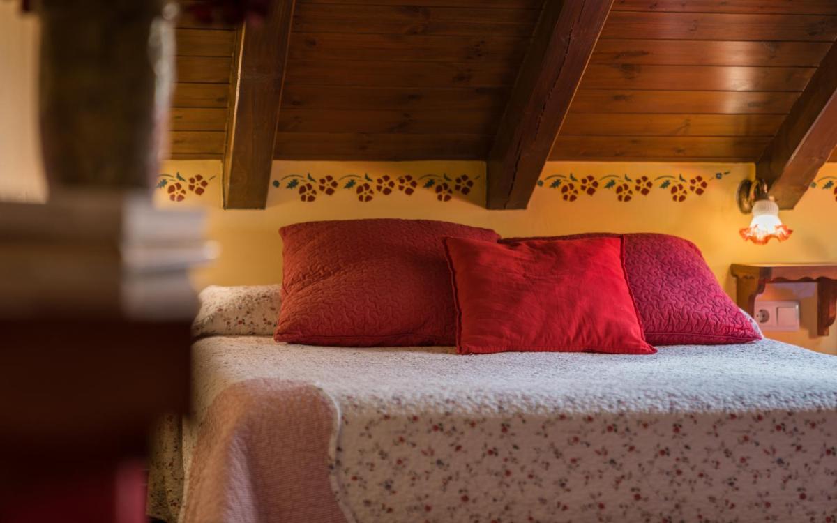 Cama o camas de una habitación en Hotel Aran La Abuela