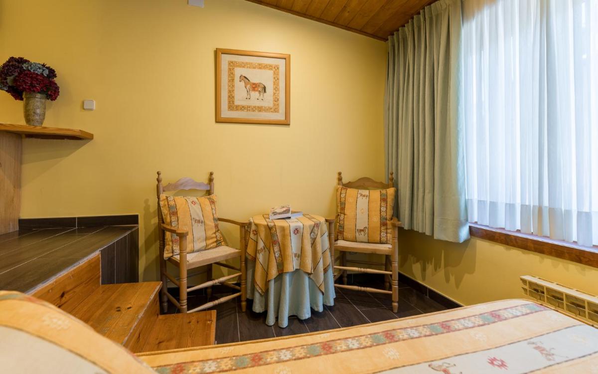 Zona de estar de Hotel Aran La Abuela