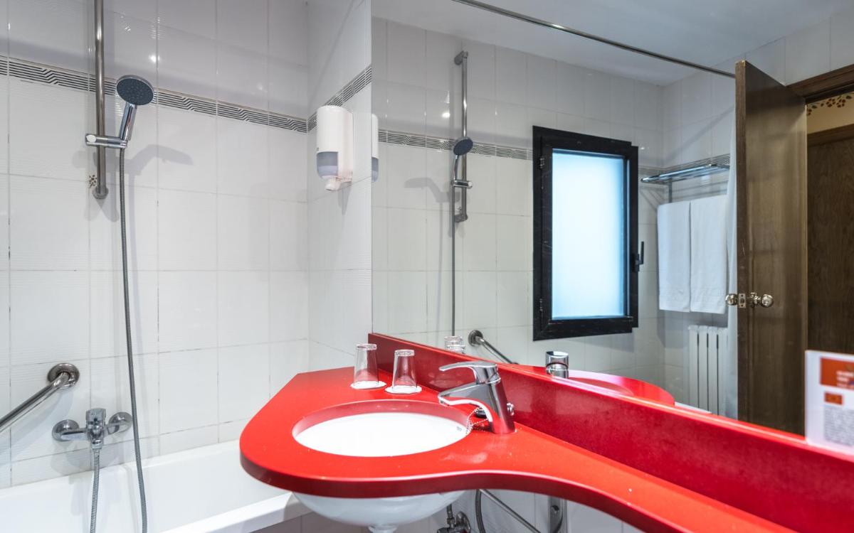 Un baño de Hotel Aran La Abuela