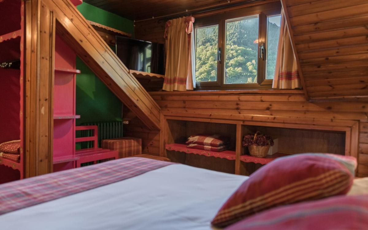 Cama o camas de una habitación en Hotel Aran La Abuela