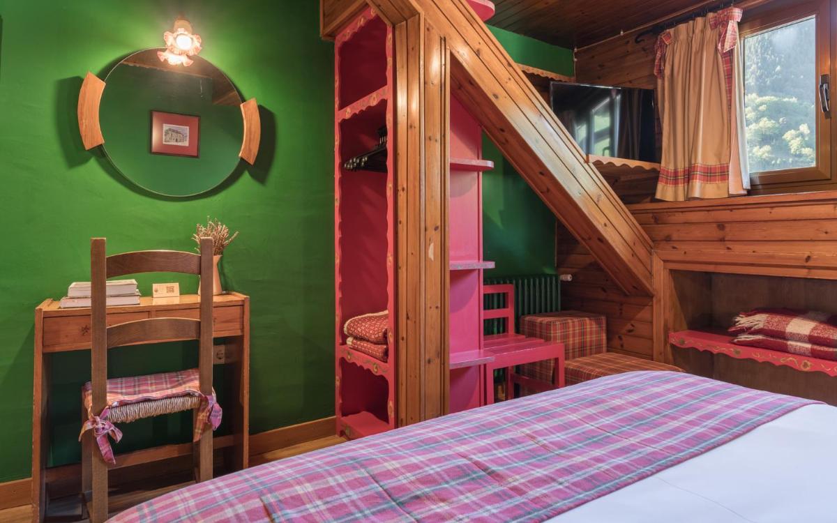 Cama o camas de una habitación en Hotel Aran La Abuela