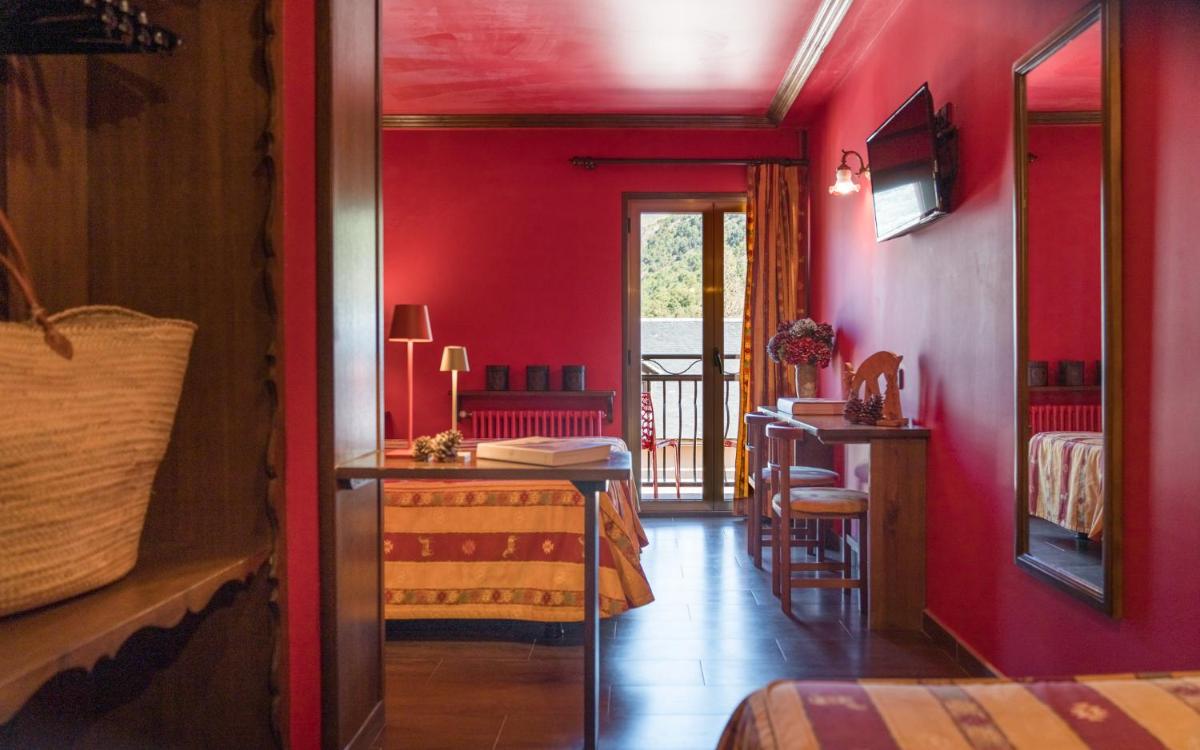 Cama o camas de una habitación en Hotel Aran La Abuela