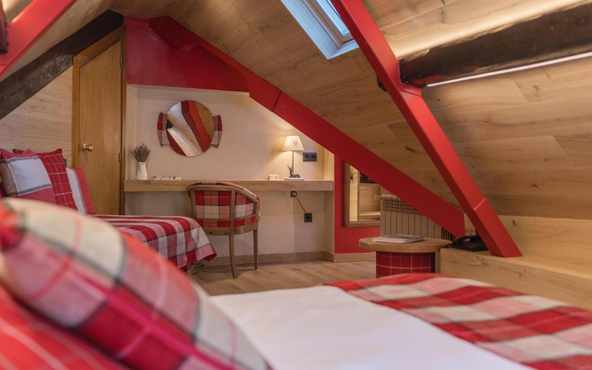 Cama o camas de una habitación en Hotel Aran La Abuela