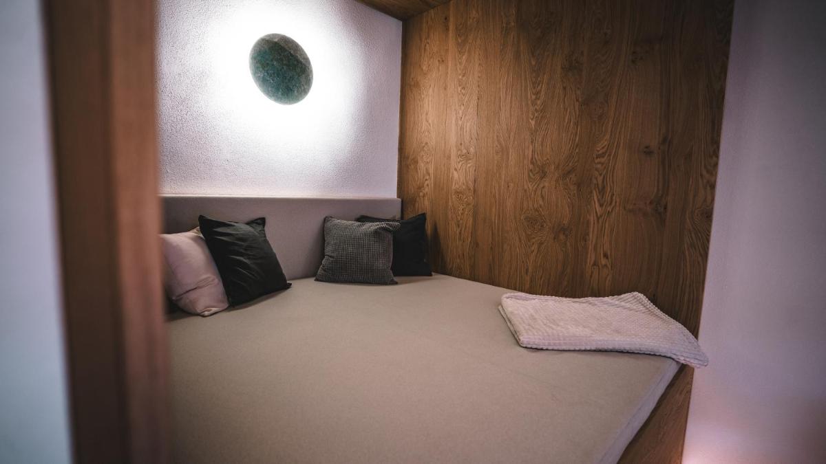 Ein Bett oder Betten in einem Zimmer der Unterkunft zeitlang by Rösslwirt