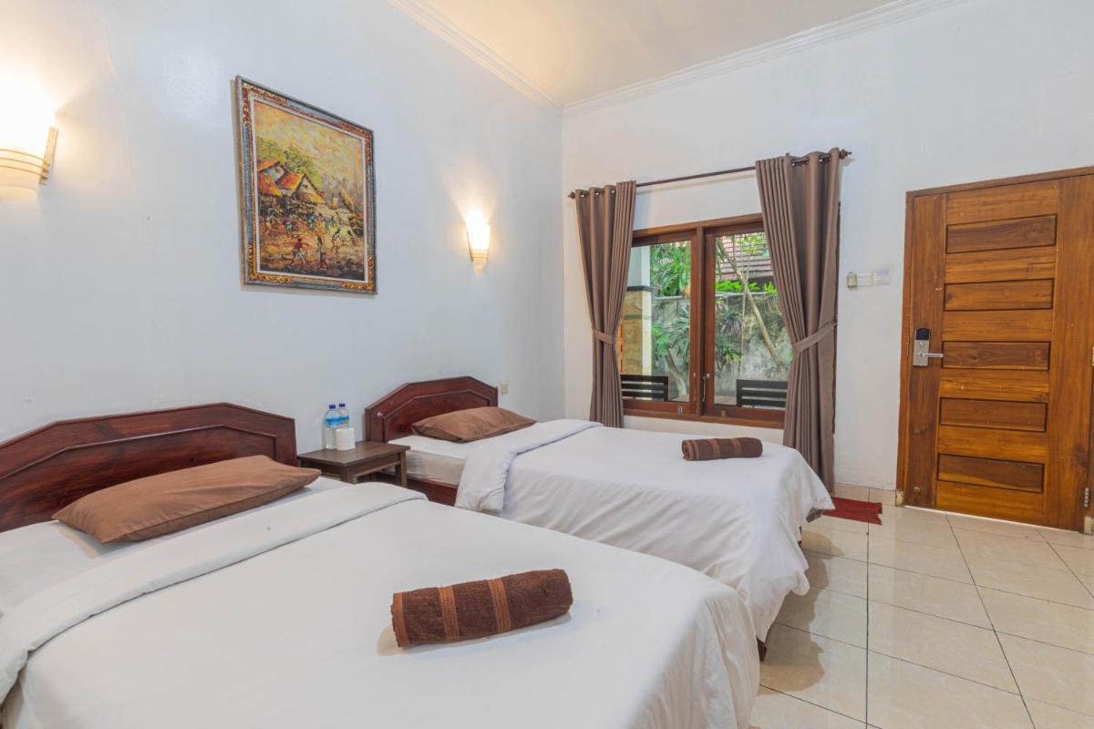 Transit Inn Senggigi - Housity