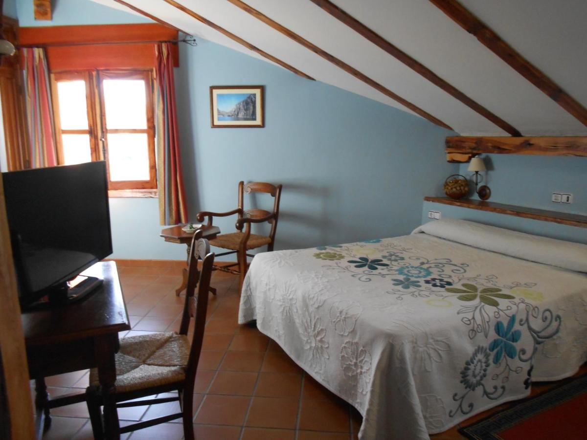 Cama o camas de una habitación en Hotel Rural & SPA Puente del Duratón