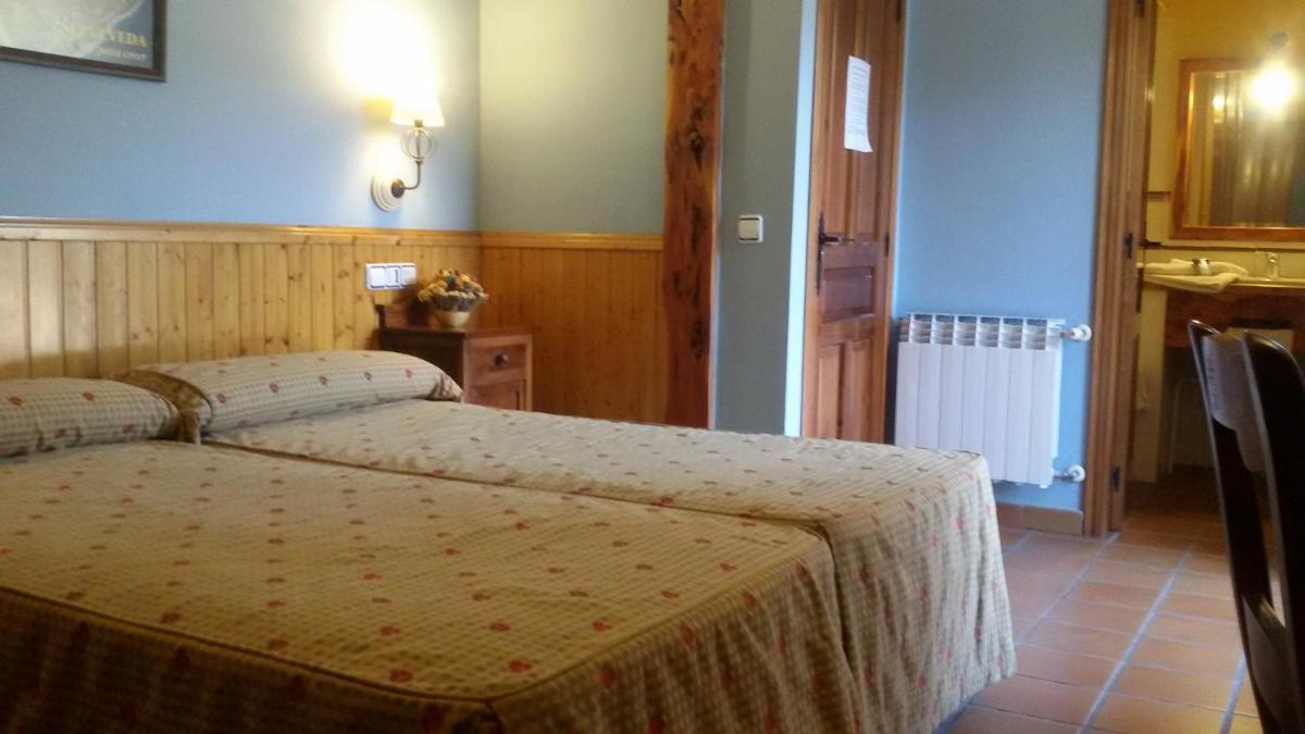 Cama o camas de una habitación en Hotel Rural & SPA Puente del Duratón