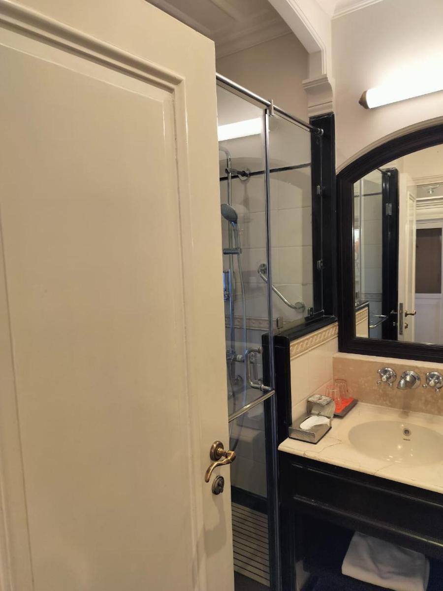 a bathroom with a sink and a glass shower at Welcomhotel by ITC Hotels, The Savoy, Mussoorie in Mussoorie