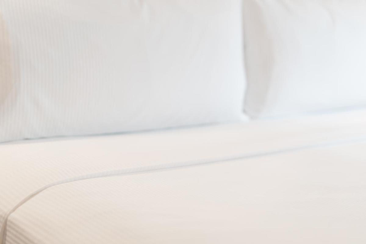 Ein Bett oder Betten in einem Zimmer der Unterkunft Hilton Berlin