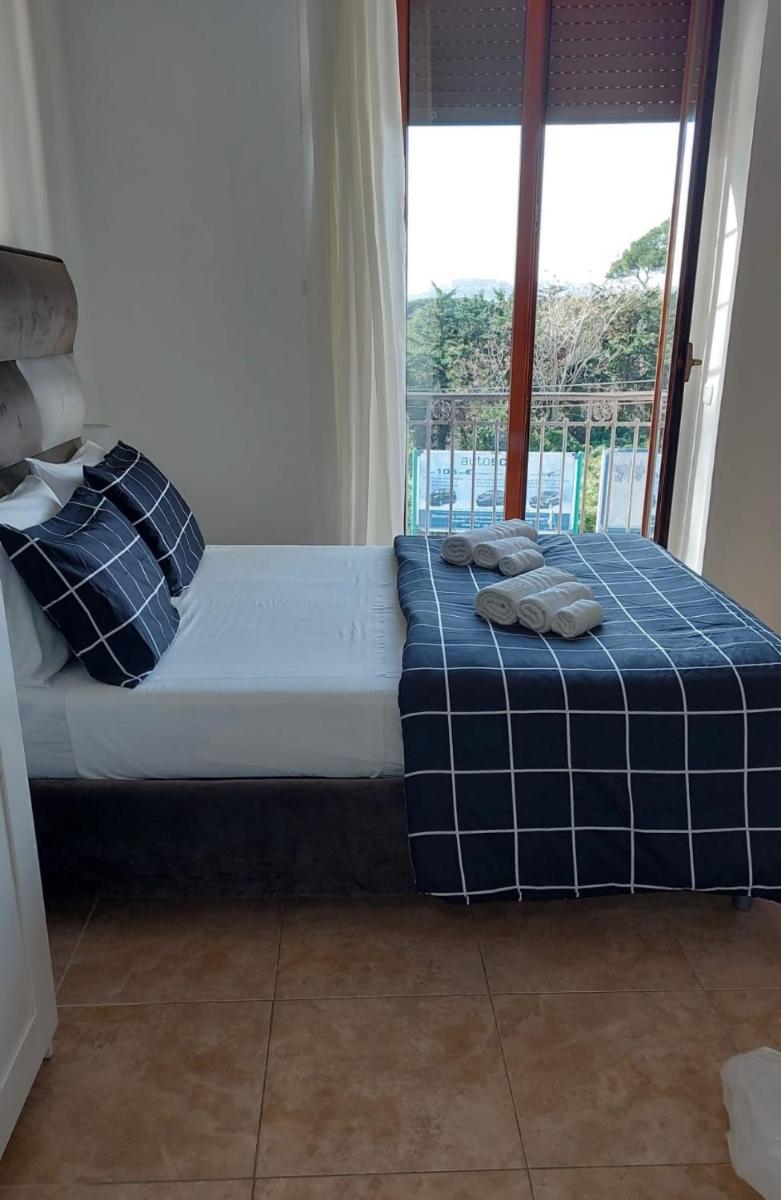 MIRIS home fast and comfortable with self check in 8 minutes walk near Naples airport - Housity
