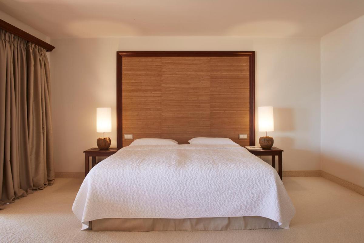 Uma cama ou camas num quarto em Vila Joya