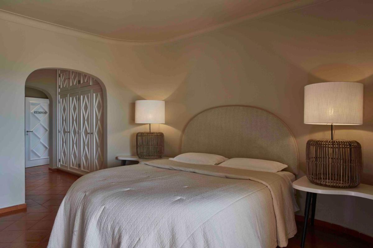 Uma cama ou camas num quarto em Vila Joya