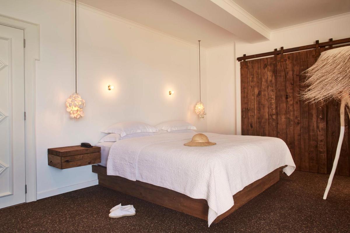 Uma cama ou camas num quarto em Vila Joya