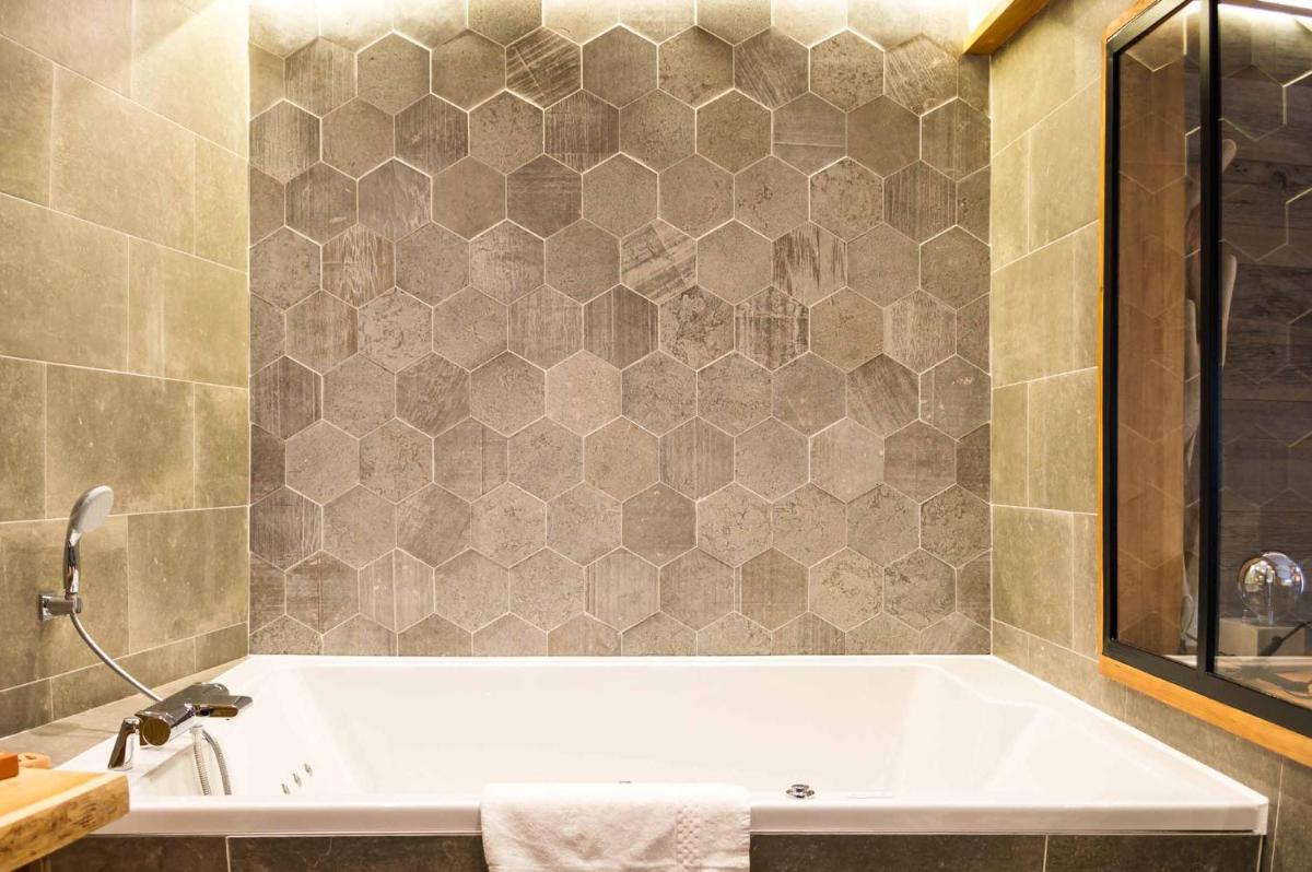 Salle de bains dans l'établissement Les Jardins d'Epicure