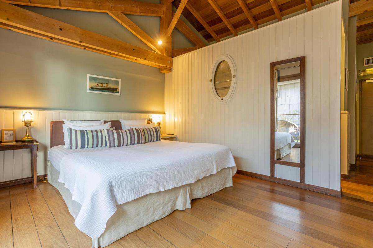 Un ou plusieurs lits dans un hébergement de l'établissement Hôtel Côté Sable